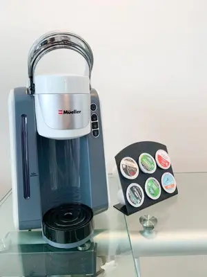 a blender sitting on a counter next to a box at Ocean View Balcony steps from Restaurants, Peacock Park & Marina in Miami