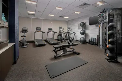a gym with several exercise equipment in a room at Fairfield Inn & Suites by Marriott Miami Airport West/Doral in Miami