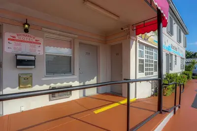 a balcony of a building with awning on it at Richard's Hotel in Hollywood