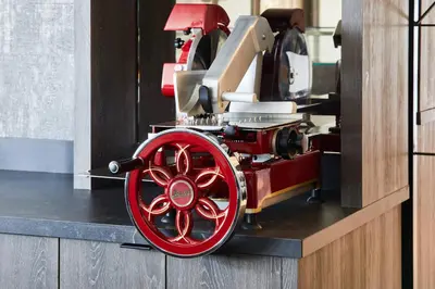 a red wheel of a fire engine sitting on a table at AC Hotel by Marriott Miami Airport West/Doral in Miami