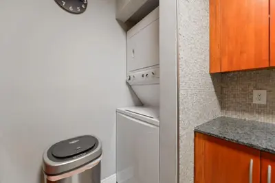 a small laundry room with a washer and dryer at Great 2 Bedrooms in Brickell in Miami