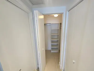 a hallway leading to a closet in a room at Lyfe-3308 in Hollywood