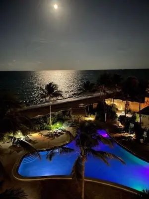 a view of a swimming pool at the beach at night at Miami Hollywood Great 2 Bedroom with Garden View 001-22bmar in Hollywood