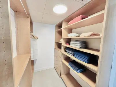 a walk in closet with wooden shelves at Miami Hollywood Incredible 2 Bedroom 2 Bathroom 005-22bmar in Hollywood