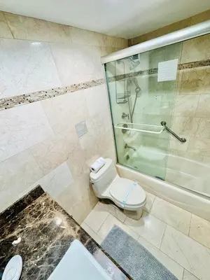 a bathroom with a shower and a toilet and a sink at Miami Hollywood Incredible 2 Bedroom 2 Bathroom 005-22bmar in Hollywood