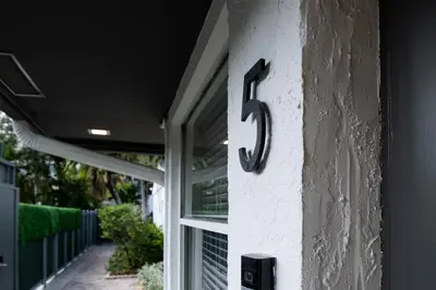 a number on the side of a house at The Lauderdale Boutique Hotel in Fort Lauderdale