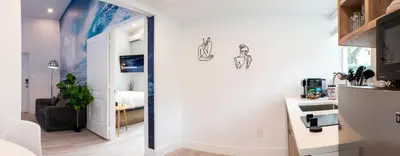 a room with a hallway with a room with a bedroom at The Lauderdale Boutique Hotel in Fort Lauderdale