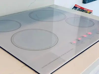 a display case with six circles on a table at Beach House BEACHFRONT STUDIO 107 in Miami Beach
