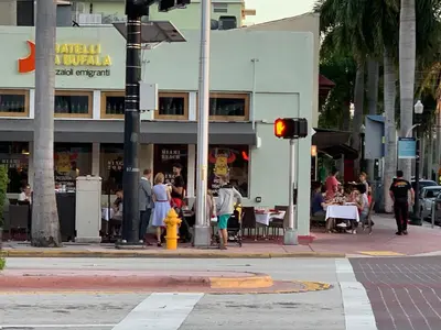 a street corner with a traffic light and a building at Beach House BEACHFRONT STUDIO 107 in Miami Beach