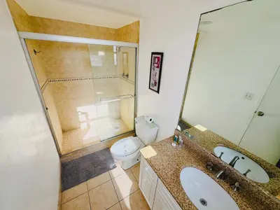 a bathroom with a shower and a toilet and a sink at Miami Hollywood Premier two bedroom with bay view 002-22bvic in Hollywood