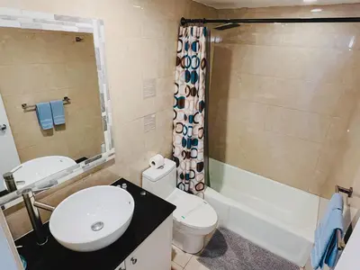 a bathroom with a toilet and a sink and a tub at Miami Hollywood Awesome 2 Bedroom 2 Bathroom 003-22bvic in Hollywood