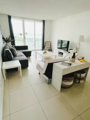 a living room with a couch and a table at Miami Hollywood 2 Bedroom on the Beach 007-21mar in Hollywood