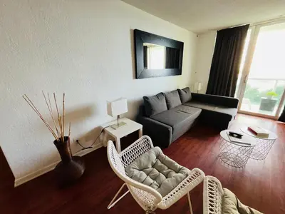 a living room with a couch and chairs and a table at Hollywood 2 Bedroom with Ocean View 004-21mar in Hollywood