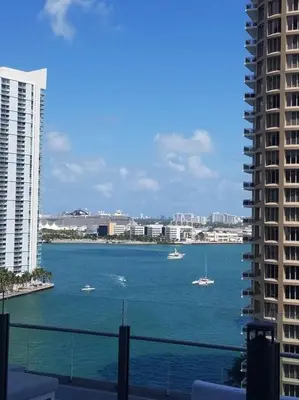 a view of a large body of water between two buildings at Iconbrickell in Miami