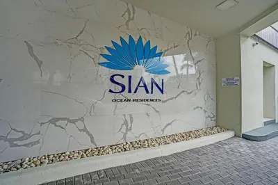 a sign on the side of a building at Luxury Beachfront Apartments 4001 S Ocean Dr in Hollywood