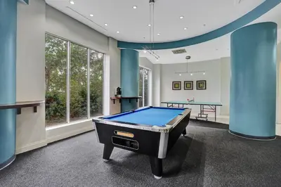 a billiard room with a pool table in it at Luxury Beachfront Apartments 4001 S Ocean Dr in Hollywood