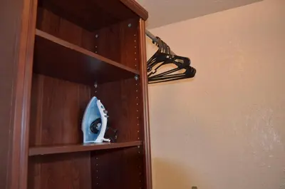 a shelf in a room with a helmet on it at La Terrace Oceanfront in Hollywood