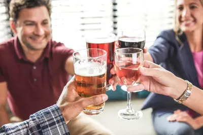 a group of people holding glasses of beer at Staybridge Suites - Fort Lauderdale Airport - West by IHG in Davie