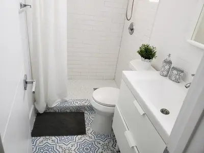 a bathroom with a toilet and a sink and a shower at Apts with Backyard Near Fort Lauderdale Beach, Nightlife, Cruise Port, Airport in Fort Lauderdale