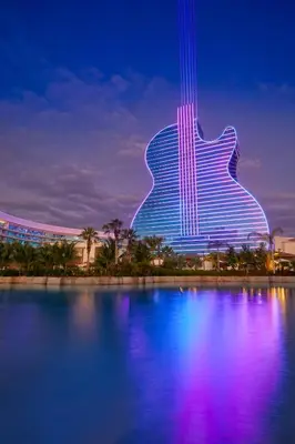a building with a guitar lit up at night at The Guitar Hotel at Seminole Hard Rock Hotel & Casino in Fort Lauderdale