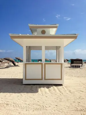 a small white building on the beach at Albion Hotel in Miami Beach