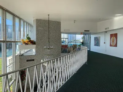 a balcony of a building with views of the city at International Inn on the Bay in Miami Beach