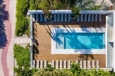 an overhead view of a swimming pool in a house at MB Hotel, Trademark Collection by Wyndham in Miami Beach