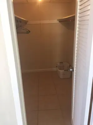 a bathroom with a shower and a tiled floor at Tides Beachfront Resort - 2 Bedroom Direct Oceanview Condo in Hollywood