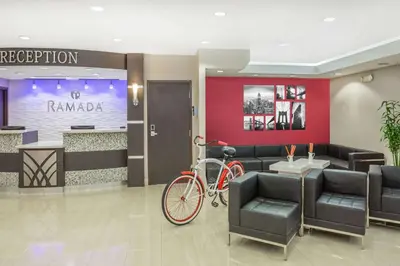 a bike parked in a lobby with a waiting room at Ramada by Wyndham Miami Springs/Miami International Airport in Miami