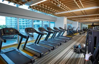 a row of treadmills in a gym at Seminole Hard Rock Hotel & Casino Hollywood in Fort Lauderdale