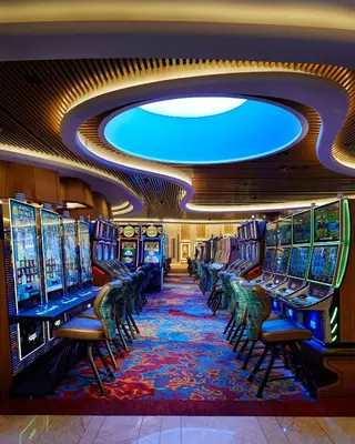 a row of pinball machines in a casino at Seminole Hard Rock Hotel & Casino Hollywood in Fort Lauderdale