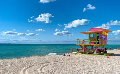 a lifeguard station on a beach with the ocean at Avalon Hotel in Miami Beach