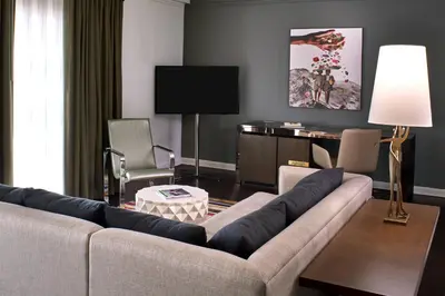 a living room with a couch and a table at Hotel Colonnade Coral Gables, Autograph Collection in Miami