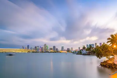 a large body of water with a city in the background at Kimpton - Hotel Palomar South Beach by IHG in Miami Beach