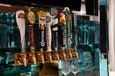a display of trophies and glasses in a bar at Wyndham Garden Miami International Airport in Miami