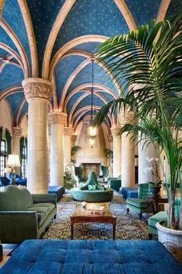 a lobby with a palm tree in a building at Biltmore Hotel Miami Coral Gables in Miami