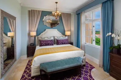 a bedroom with a king sized bed and a window at Biltmore Hotel Miami Coral Gables in Miami