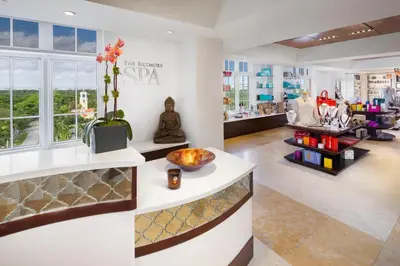 a lobby of a store with a vase of flowers at Biltmore Hotel Miami Coral Gables in Miami