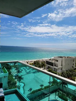 a view of the ocean from the balcony of a resort at Paradise on Hollywood Beach 2 bed 2 bath in Hollywood