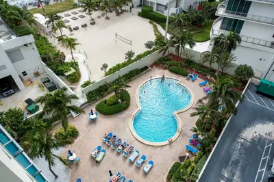 an overhead view of a swimming pool at a resort at Paradise on Hollywood Beach 2 bed 2 bath in Hollywood