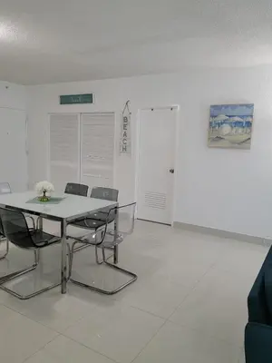 a conference room with a table and chairs in it at Paradise on Hollywood Beach 2 bed 2 bath in Hollywood