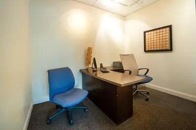 an office with two chairs and a desk and a computer at Paradise on Hollywood Beach 2 bed 2 bath in Hollywood