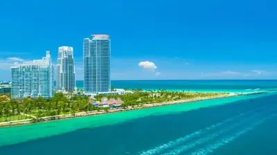 an aerial view of a beach with buildings and the ocean at Oceanfront Private Condo at 1 Hotel & Homes -1219 in Miami Beach