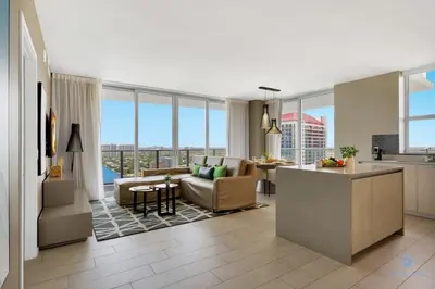a kitchen and living room with a view of a building at Luxury 3 Br- Front Intercostal View - Amazing Pools in Hollywood