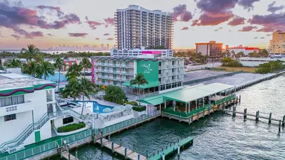 a view of a city with a marina and buildings at Palm Tree Club Miami in Miami Beach