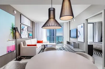 a living room with a white table and chairs at Hyde Beach House Hollywood Private Suites in Hollywood