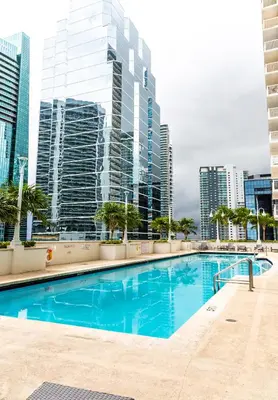 a swimming pool in a city with tall buildings at Star Stay Miami Yellow Brickell in Miami