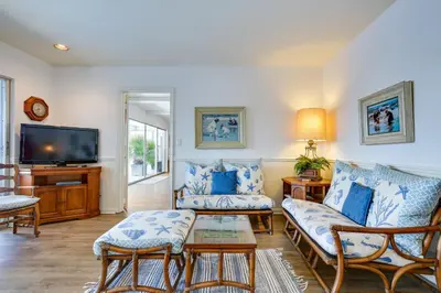 a living room with two couches and a tv at Waterfront Fort Lauderdale House with Heated Pool! in Fort Lauderdale