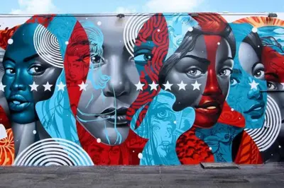 a wall with a mural of women painted on it at Casa Madeira @ the heart of Miami Design District in Miami