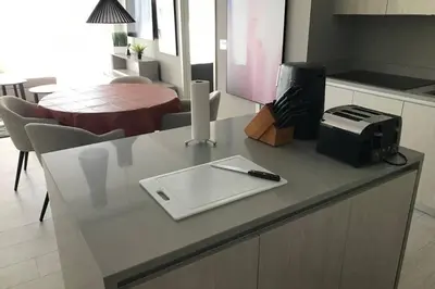 a kitchen counter with a laptop and a radio on it at Hollywood Beach luxury condo-HBH in Hollywood